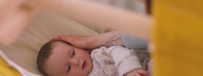 Baby in Federwiege XXL